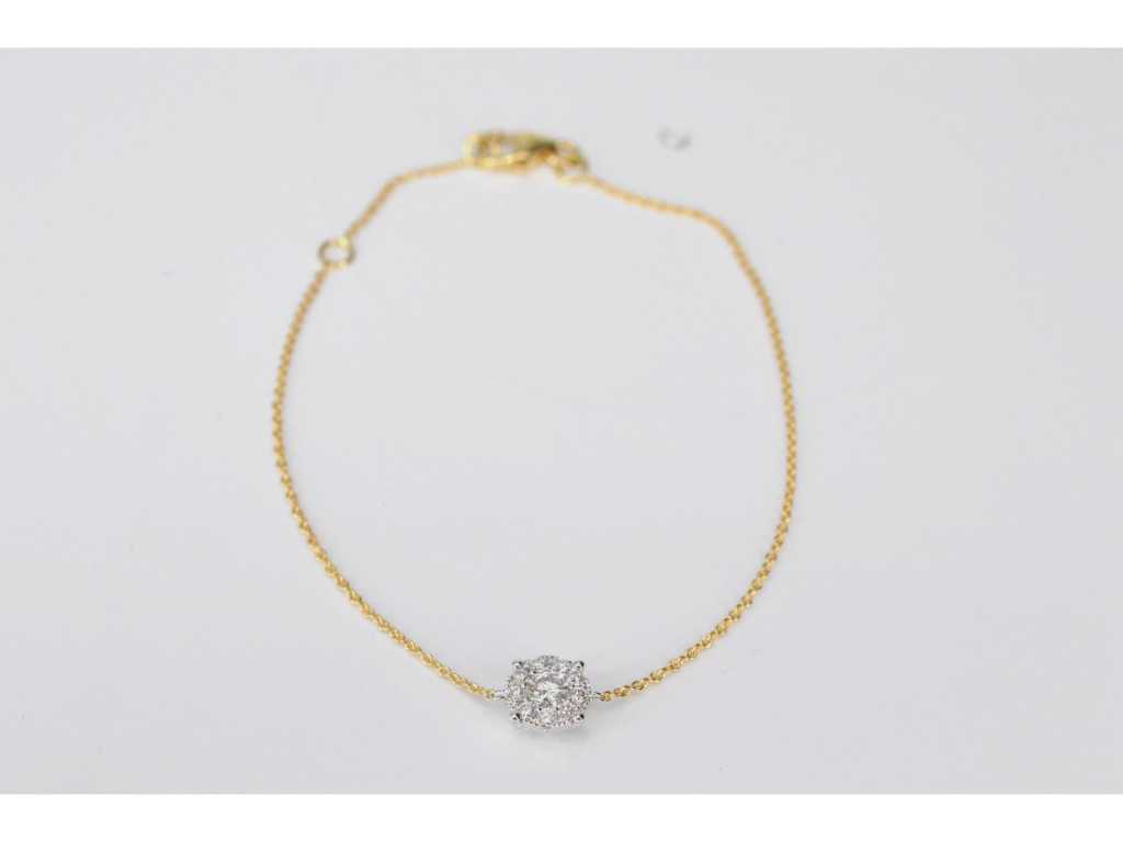Bracelet en or avec une breloque en diamant