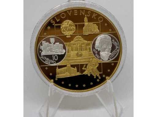 Cupru placat cu aur și argint – medalie comemorativă cu modele euro din Slovacia, diametru de 40 mm.