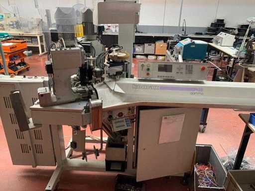 Komax - Gamma 311 - Snijmachine voor naaistripper