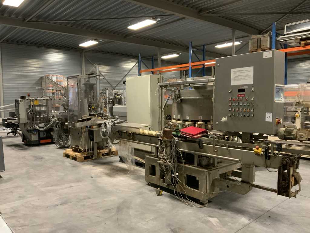 Jar filling machine with closing line
