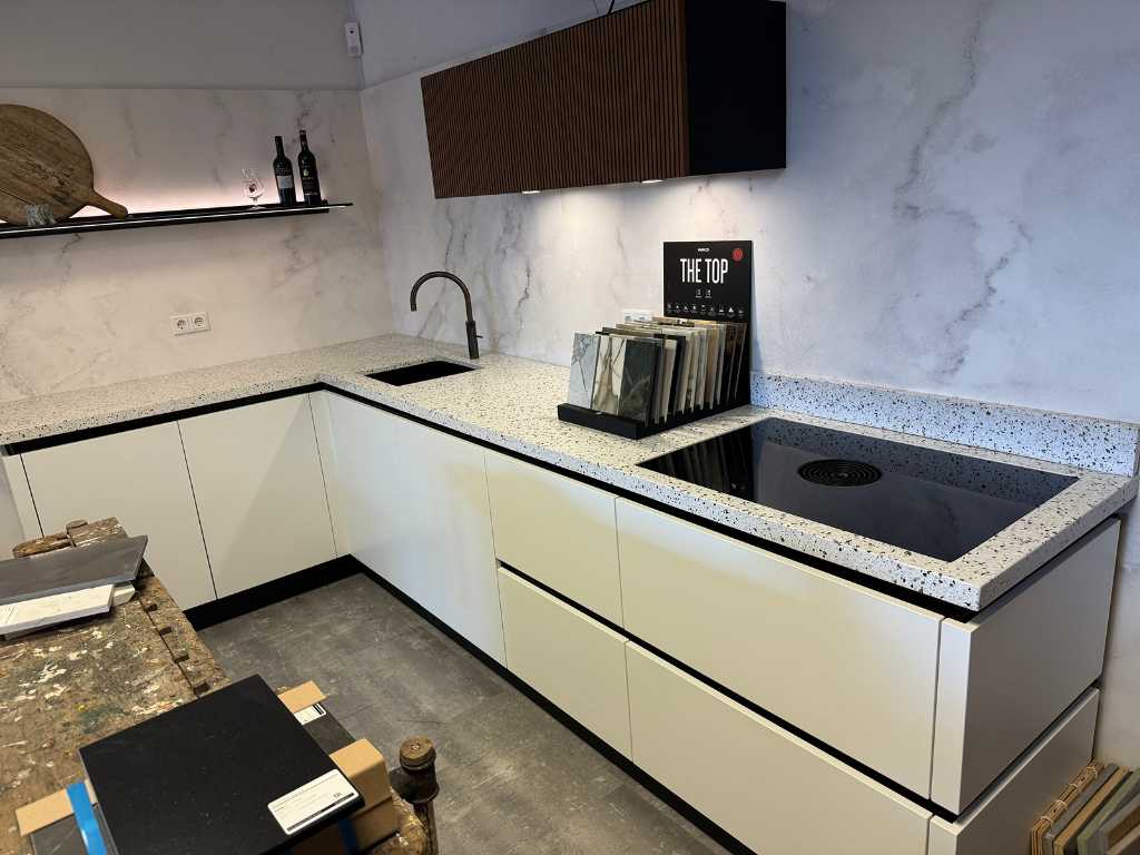 Schröder - Showroom kitchen with cupboard wall