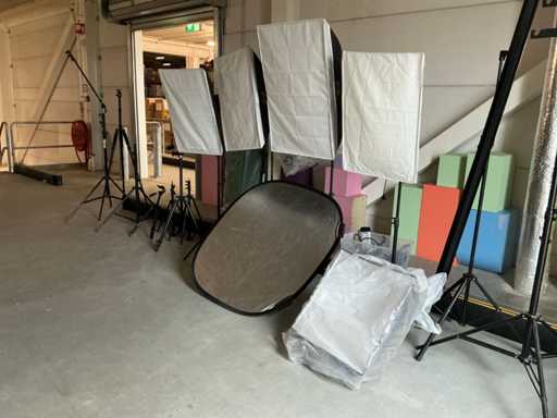 Photo studio equipment with lighting and tripods