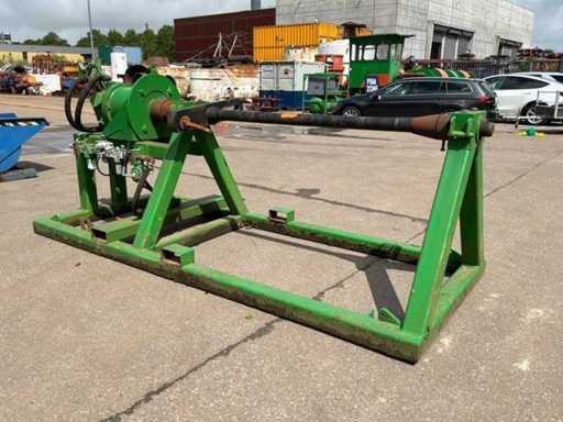 Pneumatic cable/hose reel wrapper.