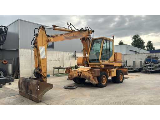 1994 Case Poclain 688BP Banden graafmachine