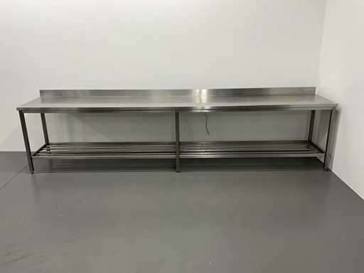 Stainless steel worktable with splashback