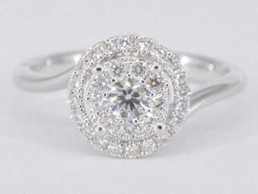 Witgouden entourage slagring met diamanten