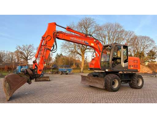 2009 Hitachi ZX140W-3 Banden graafmachine