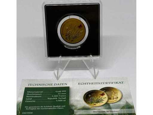 Or 999 (1/500 oz) – 3 000 francs CFA pièce commémorative « Pays des merveilles des insectes » (République du Tchad), diamètre de 22 mm.