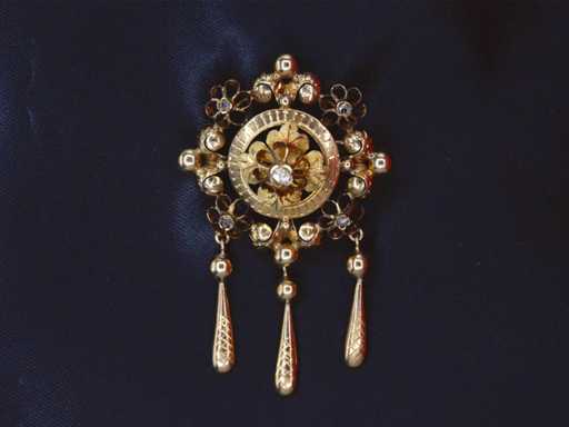 Gouden broche met diamanten