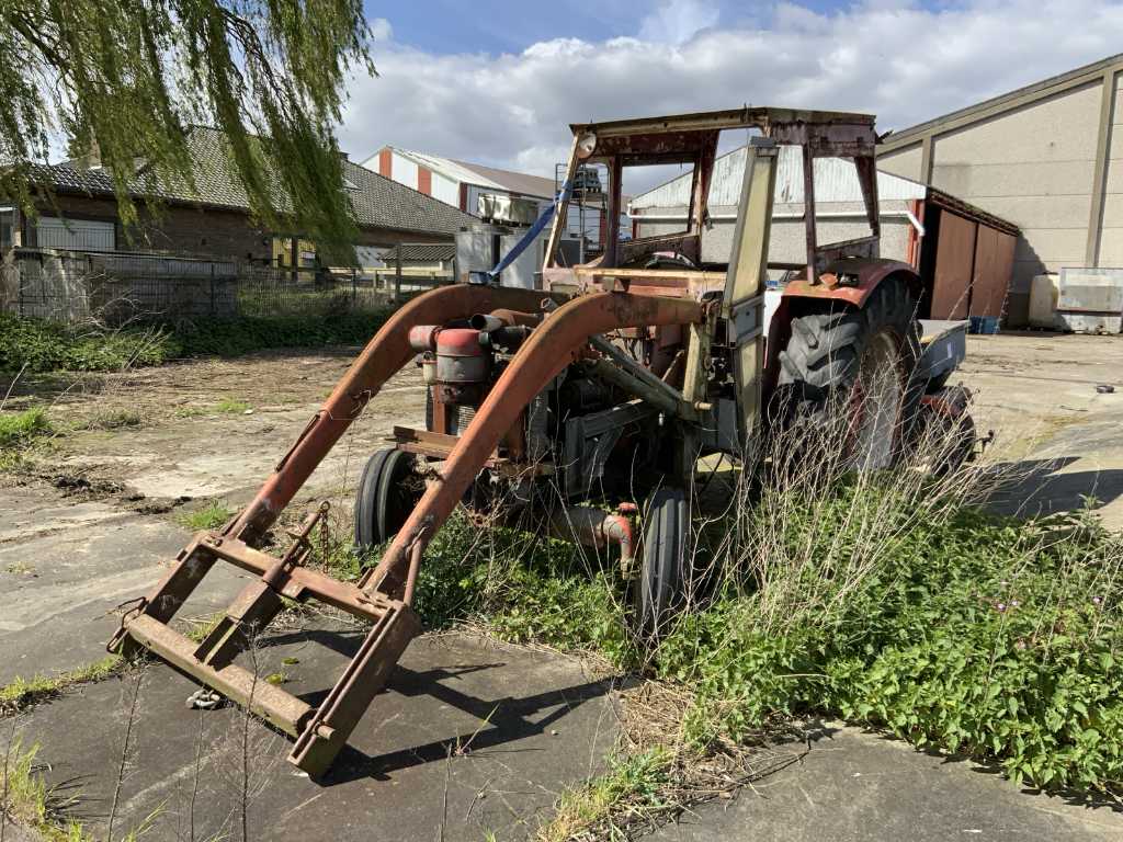 Two-wheel drive agricultural tractor for parts