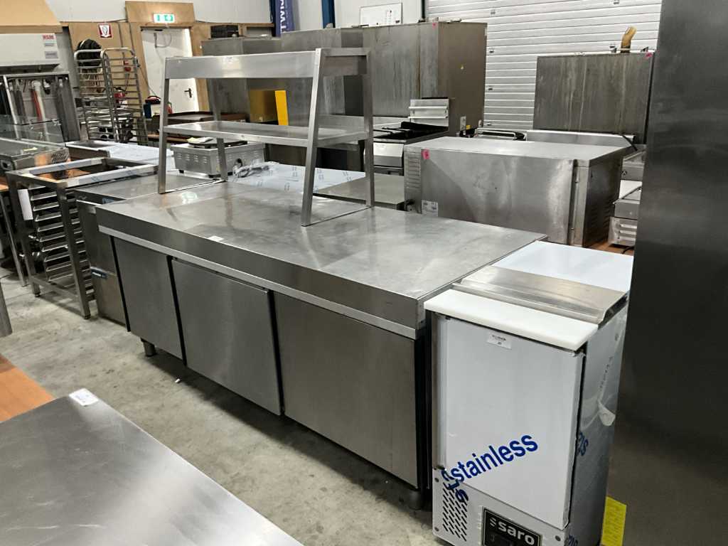 Stainless steel work table with heat bridge