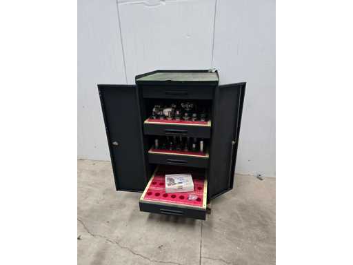  Tool cabinet with assorted milling cutters and tool holders