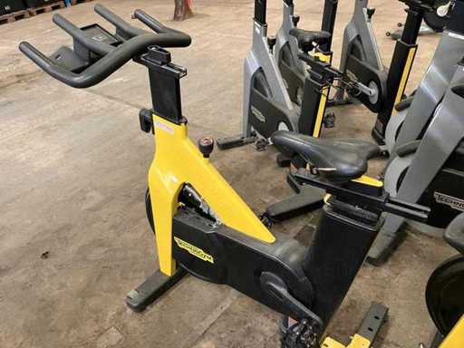 TECHNOGYM - GROUP Cycle Ride - Covered Flywheel - Yellow - Spinning Bike