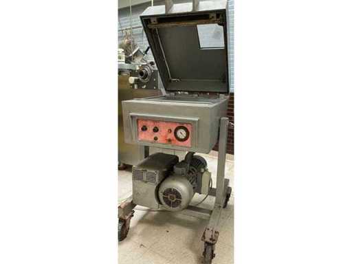 Roschermatic - vacuum machine