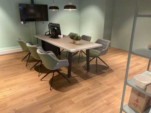 Desk with chairs and monitors