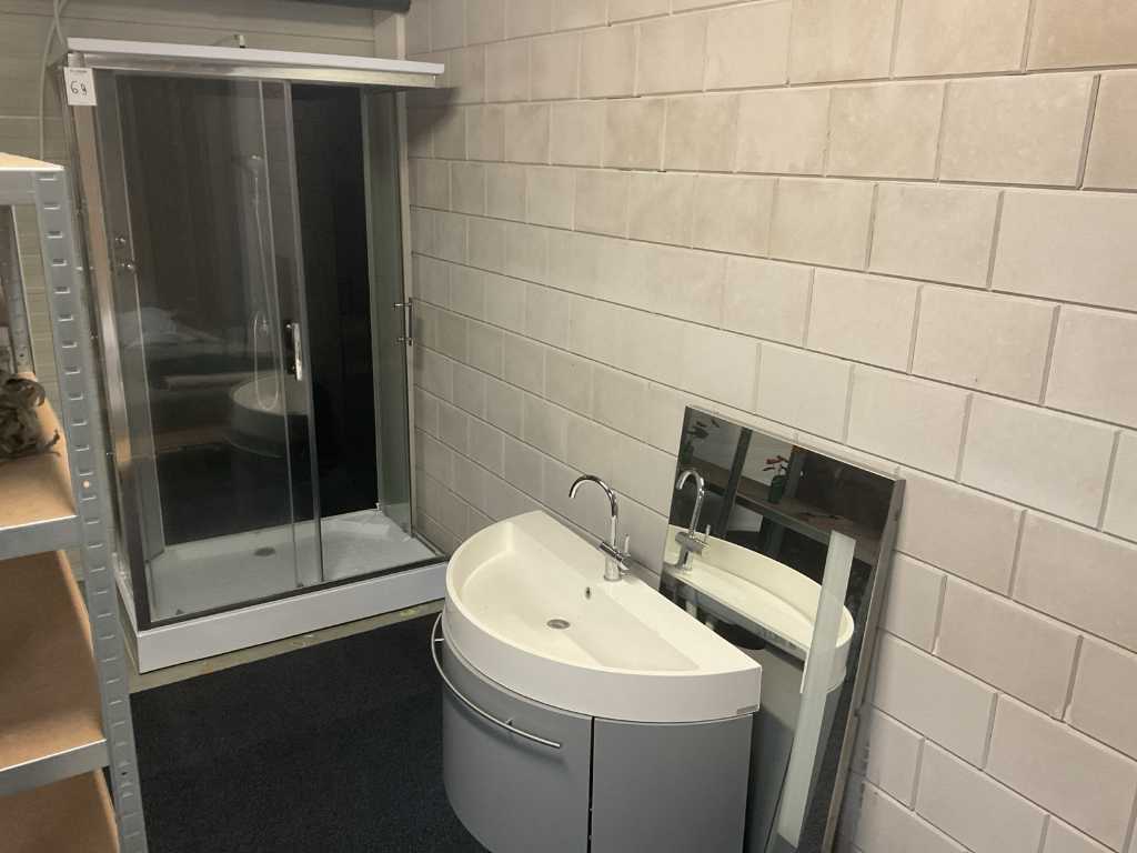 Shower cubicle and washbasin
