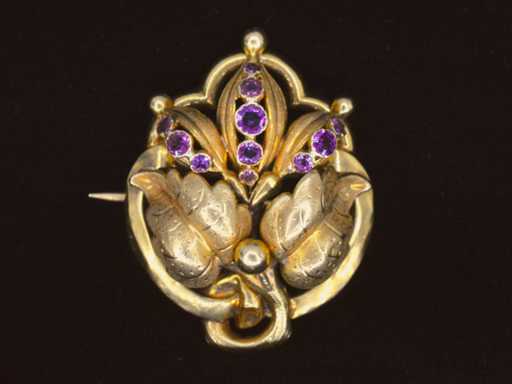 Gouden broche met amethist