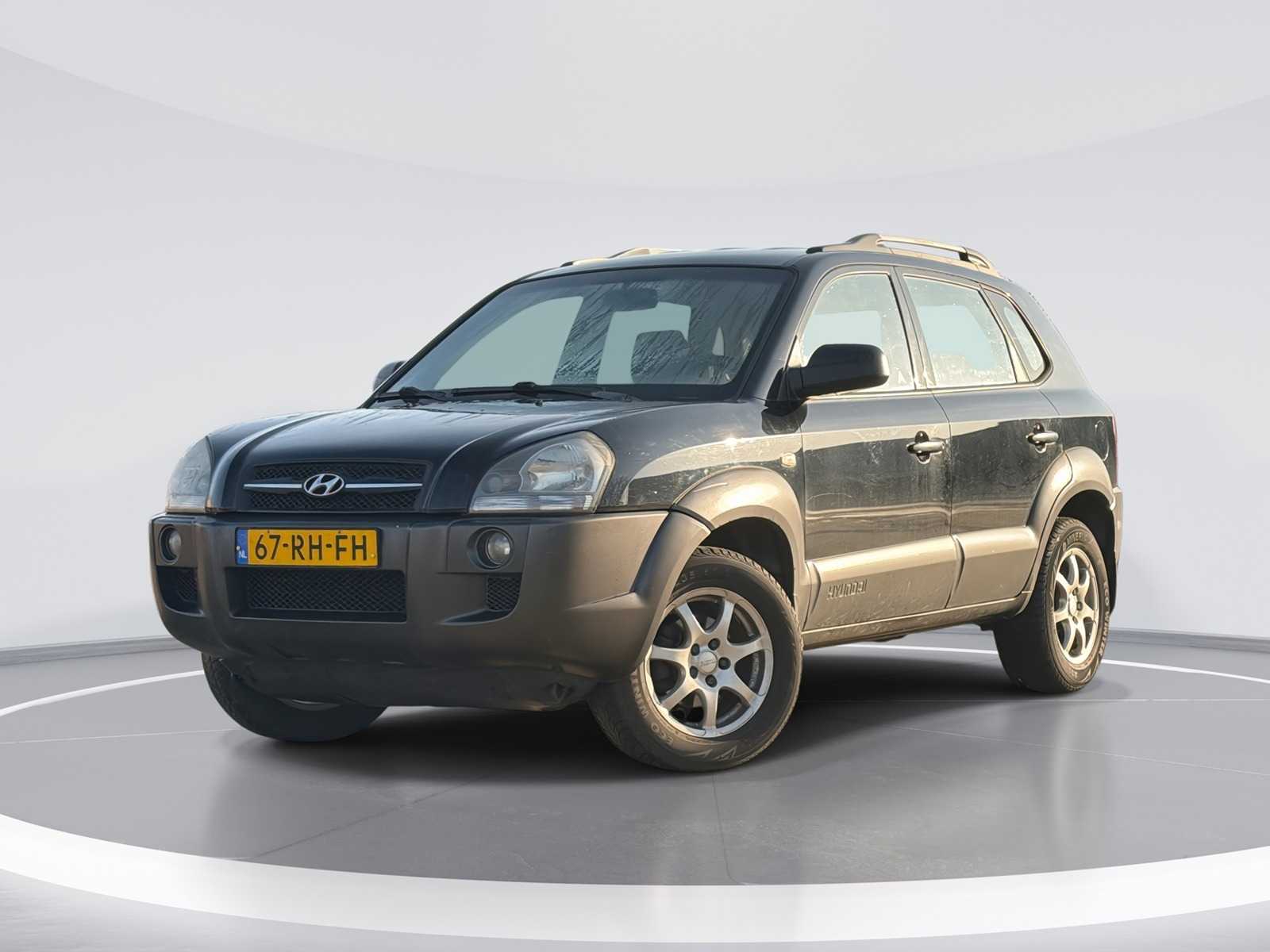 Hyundai Tucson 2.0i Active | 67-RH-FH i