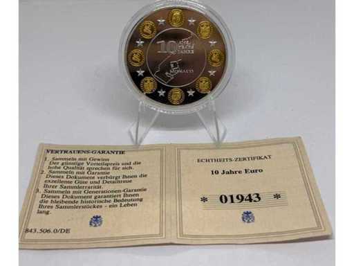 Cuivre plaqué argent avec plaquage partiel doré – pièce commémorative Saint-Marin de 10 euros, diamètre de 40 mm.