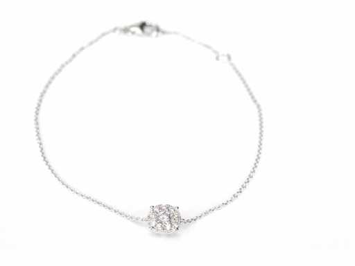 White gold bracelet with a diamond charm