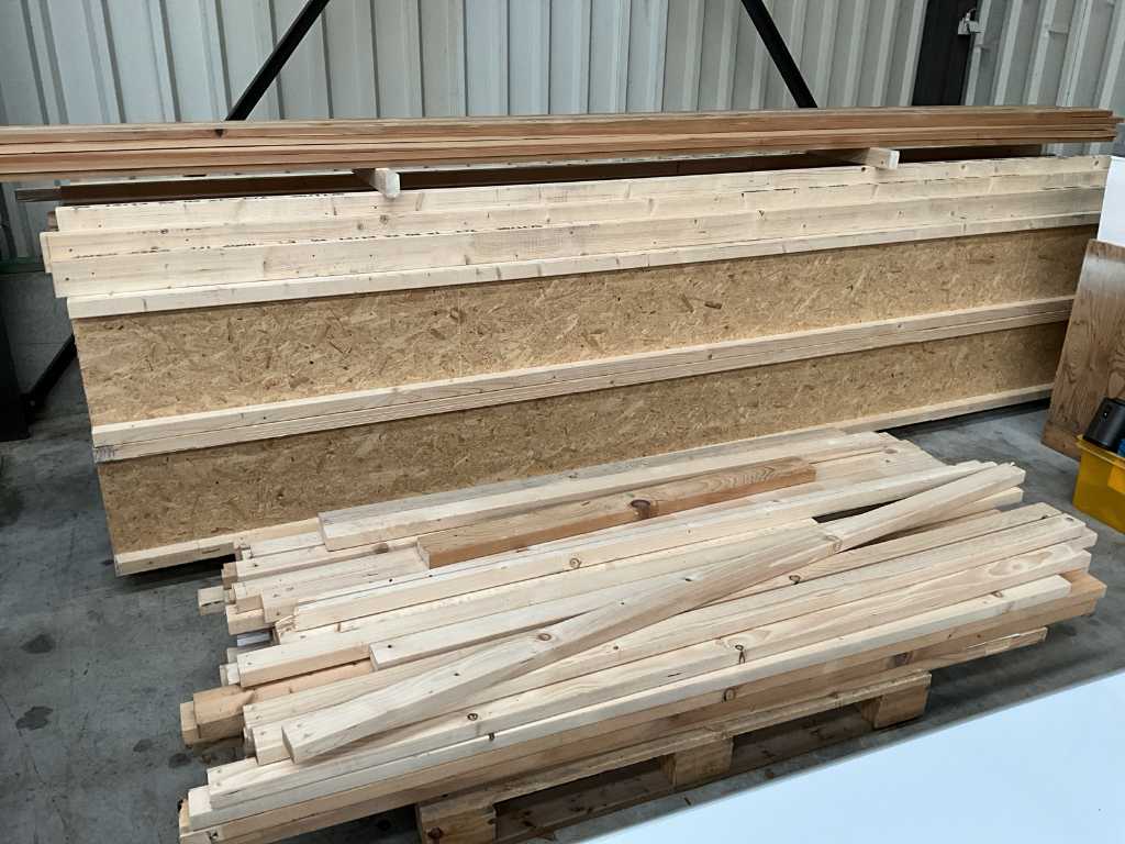 Batch of wooden beams and planks