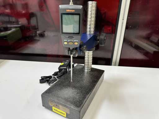   Support de mesure avec comparateur