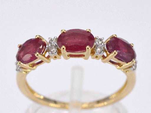 Gold ring with diamonds and ruby