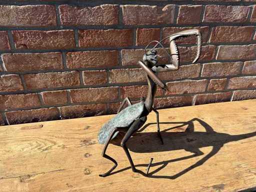 Cavalletta di bronzo