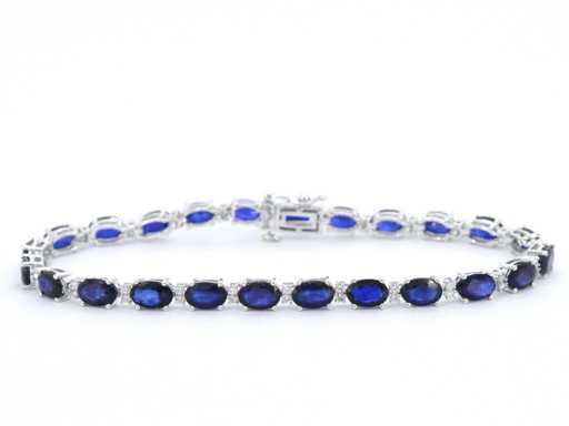 White gold tennis bracelet with diamonds and sapphire