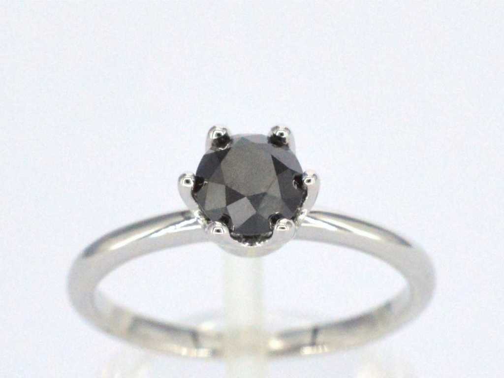 White gold solitaire ring with one brilliant-cut black diamond