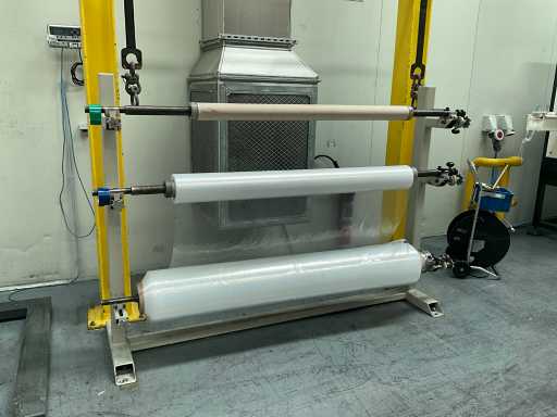 Bobine de déroulement en métal en 3 parties pour film avec contenu