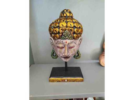 Hand carved and painted woman's head
