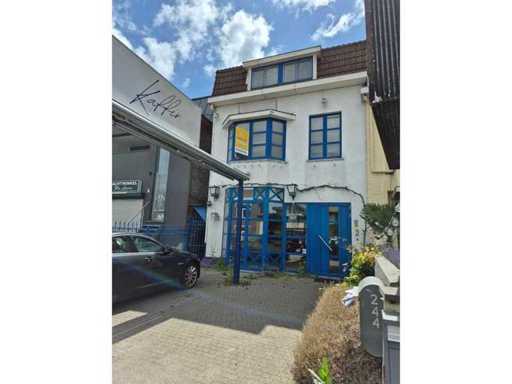 Centrally located business with duplex apartment due to bankruptcy