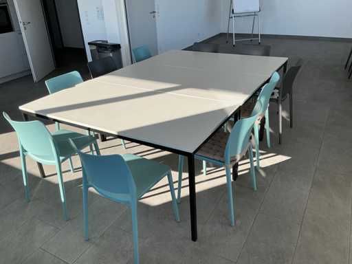 Lots of office desks and chairs