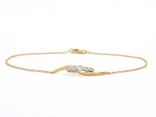 Złota bransoletka z rzędem diamentów