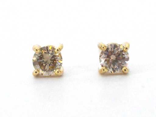 Orecchini solitari d'oro con diamanti naturali tagliati brillante