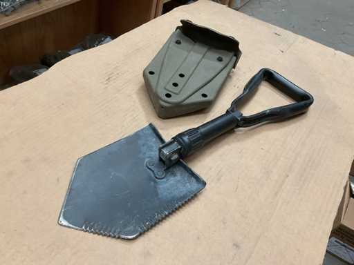 Pelle pliante dans une pochette