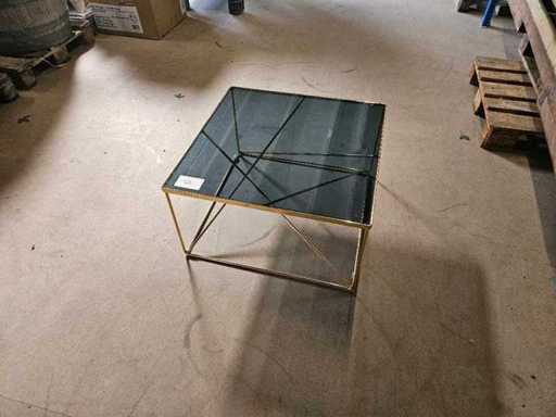 Table basse en verre en or