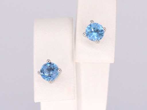 White gold earrings with topaz