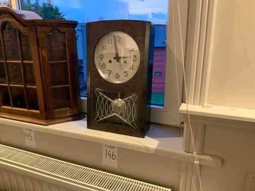 Orologio a pendolo antico