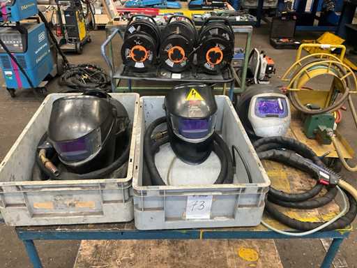 Welding helmet with torch (3x)