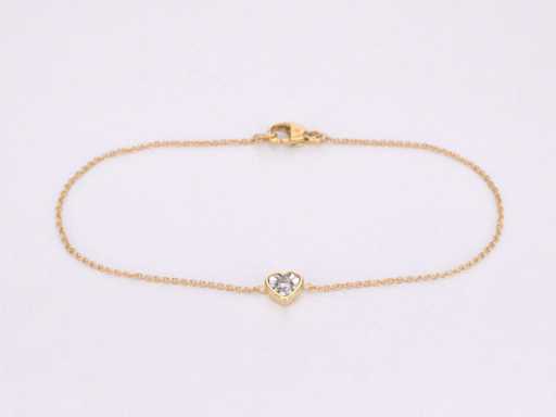 Bracelet en or avec cœur en diamant 0,10 carat
