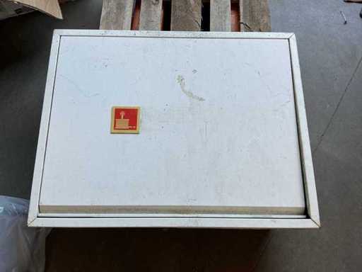 Fire hose reel in wall cabinet
