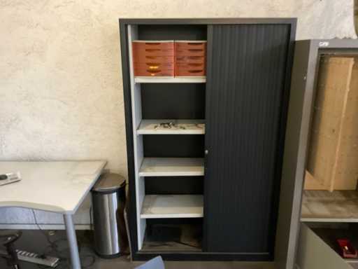 File cabinet with roller doors