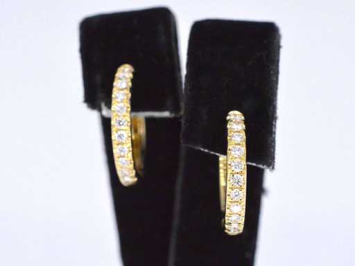 Gouden oorbellen met diamanten