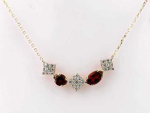 Collana in oro giallo 14 KT con ciondolo e diamante naturale 1,16 ct e granato