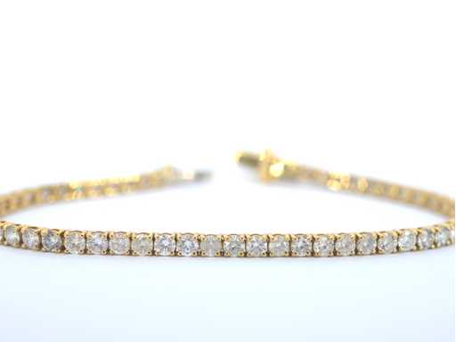 Goldenes Tennisarmband mit natürlichen brillant geschliffenen Diamanten