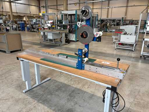   Adhesive tape applicator