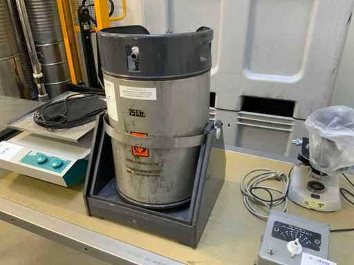 Alcohol tipping tank