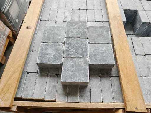 Natural stone tiles and washbasins
